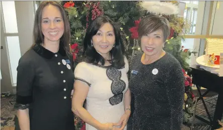  ?? PHOTOS: BILL BROOKS ?? From left, at the annual CHAS Holiday Luncheon held Dec. 4 are luncheon co-chair Carrie Ferguson, CHAS president Toshimi Sembo and luncheon cochair Vhalle Hohn. More than 630 guests attended the fabulous fund-raising event for the Children’s Cottage...