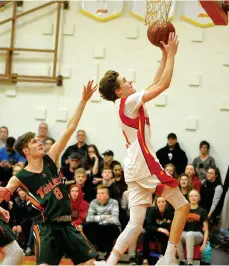  ??  ?? Central’s Riley Seaborn glides in for two points against the Peacock Toilers during recent league action.