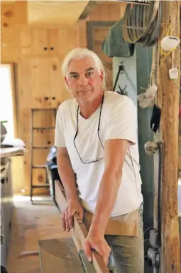  ??  ?? BEST OF BOTH WORLDS: “We make the choice when we want to go and socialize,” said Sperryvill­e craftsman Bob Lucking. “If you want to become a hermit, you can do that, too.”