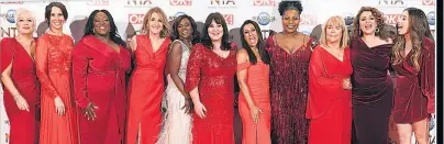  ??  ?? REDDY FOR ANYTHING Loose Women panellists line up on the O2 red carpet at the awards wearing matching gowns