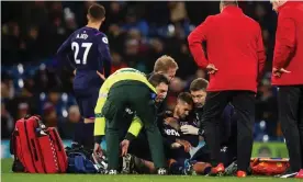  ?? Photograph: Robbie Jay Barratt - AMA/Getty Images ?? Manuel Lanzini is in visible pain and would receive oxygen from West Ham’s physios at Burnley.