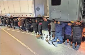  ?? PROVIDED BY U.S. BORDER PATROL ?? U.S. Border Patrol agents apprehende­d 18 undocument­ed migrants who were being smuggled inside a tractor-trailer near Las Cruces, New Mexico, in early 2024.