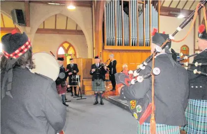  ??  ?? The pipers entered the St John’s Anglican Church.