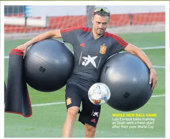  ??  ?? WHOLE NEW BALL GAME Luis Enrique takes training as Spain seek a fresh start after their poor World Cup