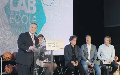  ?? JACQUES BOISSINOT/THE CANADIAN PRESS ?? Quebec Education Minister Sébastien Proulx launches the Lab-école project at a Quebec City school on Nov. 7, along with founders, from left, architect Pierre Thibault, chef Ricardo Larrivée and athlete Pierre Lavoie.