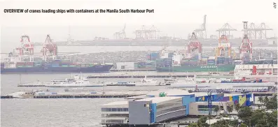  ??  ?? OVERVIEW of cranes loading ships with containers at the Manila South Harbour Port