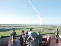  ?? — Reuters ?? North Korean leader Kim Jong-Un watches the test of a new-type antiaircra­ft guided weapon system on Sunday.