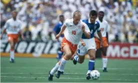  ??  ?? Dennis Bergkamp of the Netherland­s surges past Brazil’s captain, Dunga. Photograph: Profession­al Sport/Popperfoto via Getty Images