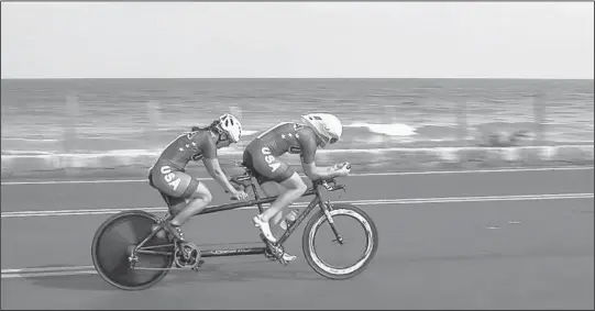  ?? GETTY IMAGES FILE ?? Shawn Cheshire, in back, and Mackenzie Woodring compete in the Women’s Time Trial during the Rio 2016 Paralympic Games.