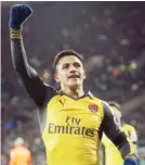  ??  ?? Arsenal's Alexis Sanchez celebrates after scoring a goal during the English Premier League soccer match between West Ham United and Arsenal at The London Stadium in London, yesterday