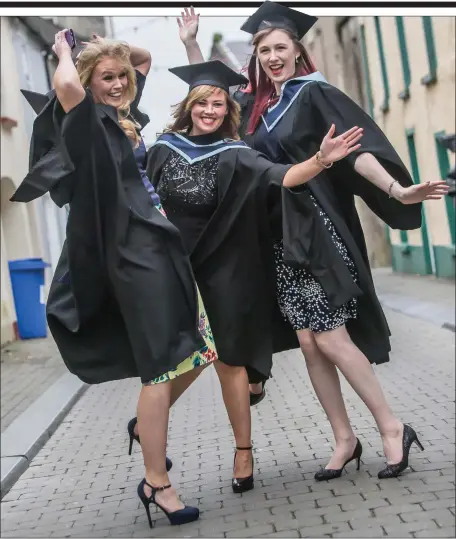  ??  ?? Delighted graduates Ellie Byrne, Foulksmill­s; Michelle Harding, Curracloe; and Birute Malinauska­ite from Laois.