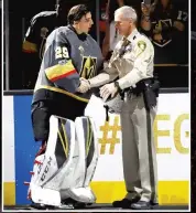  ?? PHOTO AFP ?? Marc-andré Fleury a été touché par sa brève rencontre avec un intervenan­t qui est venu en aide aux victimes de la tuerie.