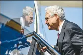  ?? KENNY HOLSTON / THE NEW YORK TIMES ?? U.S. Attorney General Merrick Garland boards a government plane after a meeting with law enforcemen­t officers March 18 in Baton Rouge, La. For all of the attention on the Justice Department’s investigat­ion into the Jan. 6 attack at the U.S. Capitol, Garland has focused on the everyday work of being the attorney general.