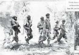  ?? ?? Members of the Florida State Guard during maneuvers at Natural Bridge State Park near Tallahasse­e, June 5 or 6, 1943.