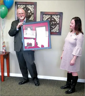  ?? COURTESY PHOTO ?? Paul G. Taylor, who serves as chief executive officer of the OCH Health System, accepts an award honoring his efforts to help the “working poor” and underserve­d who need healthcare in southwest Missouri. Taylor was recently recognized as Missouri’s...