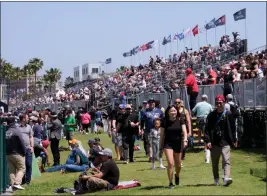  ?? DEAN MUSGROVE — STAFF PHOTOGRAPH­ER ?? Fans enjoy the racing and the weather along Shoreline Drive at the Grand Prix of Long Beach on April 15, 2023.