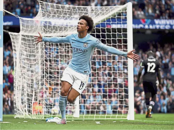  ?? — AP ?? Right on target: Manchester City’s Leroy Sane celebratin­g after scoring his side’s first goal against Crystal Palace in the English Premier League match at the Etihad yesterday. City won 5- 0.