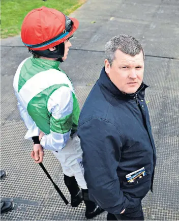  ??  ?? Rock bottom: Gordon Elliott must try to rebuild his reputation; (left) the photograph that landed the trainer in hot water