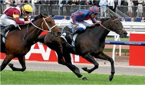  ?? GETTY IMAGES ?? A Prince Of Arran and rider Michael Walker win the Lexus yesterday.