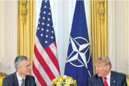  ?? KEVIN LAMARQUE • REUTERS ?? U.S. president Donald Trump meets with NATO secretary general Jens Stoltenber­g ahead of the NATO summit in Watford, England on Tuesday.