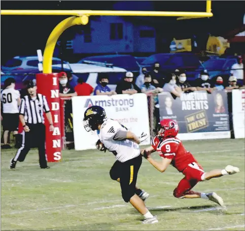  ?? MARK HUMPHREY ENTERPRISE-LEADER ?? Prairie Grove sophomore tight end Matthew Velasco shakes off a tackle by Stilwell, Okla., linebacker Cutter Sheets while scoring on an 18-yard touchdown pass from Knox Laird during Friday’s nonconfere­nce 48-13 win.