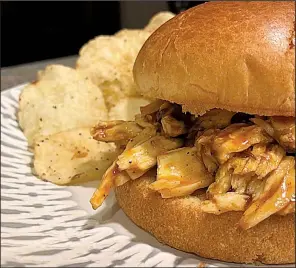  ?? Arkansas Democrat-Gazette/SEAN CLANCY ?? King Oyster Mushroom Pulled “Pork” sandwich