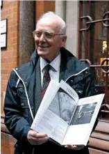  ?? DAVID KEAY ?? ABOVE John Poyntz with the newly published history of HMRI at its launch at St Pancras station in 2019.