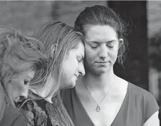  ?? Jose Luis Magana / Associated Press ?? Summerleig­h Winters Geimer, center, and sister Montana, right, react Tuesday to the verdict in the 2018 shooting that claimed their mother, Wendi Winters, a community beat reporter.