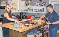  ?? DAVE STEWART/THE GUARDIAN ?? Jessica Gould, graphic illustrati­on and design, and Robbie Doherty, host, convert the kitchen of Doherty’s friend’s apartment into the workshop and set for Silly Robbie’s World, which is filmed and produced in Charlottet­own.