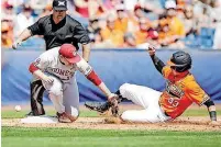  ?? [PHOTO BY IAN MAULE, TULSA WORLD] ?? Oklahoma infielder Brylie Ware, left, fails to control the ball while attempting to tag out Oklahoma State’s Trevor Boone during Sunday’s Bedlam baseball game in Tulsa.