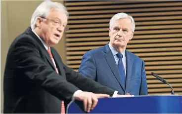  ?? /Reuters ?? Stalemate: David Davis (left), the British secretary of state for exiting the EU, and the EU’s chief negotiator in charge of Brexit negotiatio­ns, Michel Barnier, address media representa­tives at the European Commission in Brussels on Thursday.