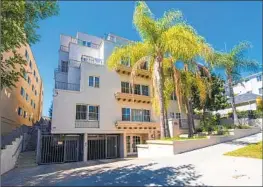  ?? Maher Commercial Realty ?? IN MARCH, 126 L.A. homes and condos sold for more than $5 million, according to the Multiple Listing Service. This apartment building sold for $11 million.