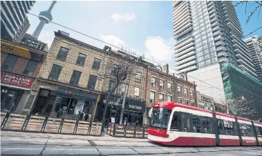  ?? ANDREW FRANCIS WALLACE FILE PHOTO TORONTO STAR ?? An experiment to improve transit and bring more people to King Street businesses was quick, inexpensiv­e and effective.