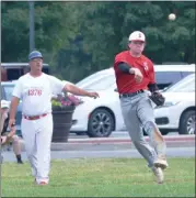  ??  ?? Sherrill third baseman Zach Nell charges and fires a throw to first during American Legion District 5play against NewHartfor­d on Thursday, July 11.