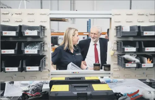  ?? PICTURE: DANNY LAWSON/PA WIRE ?? YORKSHIRE VISIT: Labour leader Jeremy Corbyn talks to staff member Emma Anstey during a tour of OE Electrics in Wakefield.