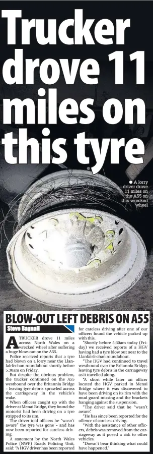  ??  ?? A lorry driver drove 11 miles on the A55 on this wrecked wheel