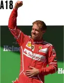  ?? —AFP ?? Sebastian Vettel celebrates