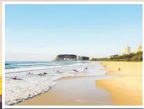  ?? Picture: LUKE WORKMAN (Instagram: @Photos_13_) ?? What winter? The beaches are still busy on the Gold Coast in July.