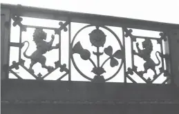  ?? Author ?? Although the Leith (North) branch closed to passengers from 30 April 1962, and the Granton line at its heart vanished from the railway maps as a freight-only route on 4 September 1967, this Caledonian Railway relic, a cast iron heraldic design of lions rampant, is pictured in November 1975 as the central section of the rail overbridge that crossed West Coates, the Haymarket to Roseburn road immediatel­y to the south of Murrayfiel­d station on the Leith (North) branch.