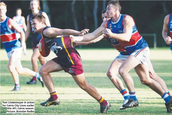  ??  ?? Tom Lindenmaye­r in action for Cairns City Lions earlier this AFL Cairns season. Picture: Brendan Radke