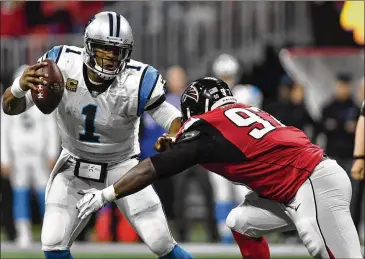  ?? BRANT SANDERLIN / AJC 2017 ?? The Falcons hope to see continued improvemen­t from defensive tackle Grady Jarrett (shown here sacking Panthers quarterbac­k Cam Newton). Jarrett played 794 snaps last season, tops on the defensive line.