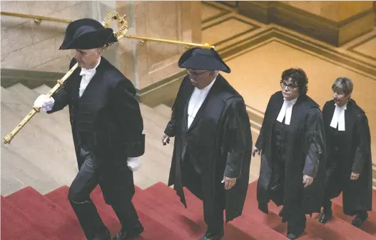  ?? KAYLE NEIS ?? Saskatchew­an House Speaker Randy Weekes, second left, has cracked down on legislatur­e members who he says have defied his authority and impugned him.