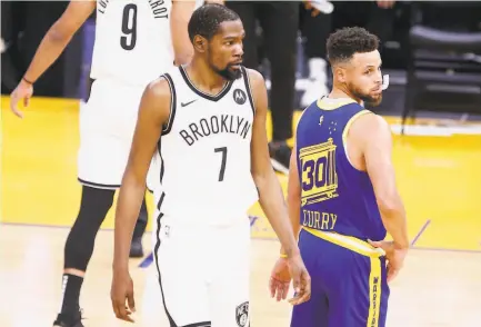 ?? Photos by Santiago Mejia / The Chronicle ?? Above, Kevin Durant and Stephen Curry take a good look around in the first quarter Saturday. Durant finally got to play in Chase Center — and he delivered. Below, James Harden, who had 16 assists in the Nets’ win, is guarded by Curry.