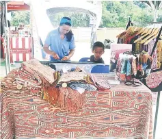  ??  ?? A stall selling Pua Kumbu, an iconic woven fabric of the Ibans in Kapit.