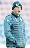  ??  ?? ON A ROLL: Paul Cook watches on as Wigan win