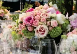  ??  ?? Enchanted forest: Beautiful full-sized flowering cherry trees almost fill the dome of the couple’s towering marquee