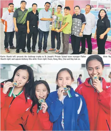  ??  ?? Karim (fourth left) presents the challenge trophy to St Joseph’s Private School team manager Father (fourth right) and captain Anthony Kho while (from right) Kwon, Kong, Wee, Chai and Ong look on. Alvin Ng (From left) Darlene Aliya, Janessa Liew Jia...