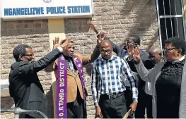  ?? Picture: ZIYANDA ZWENI ?? SANCTIFY: Pastors from the OR Tambo Council of Churches pray for divine interventi­on at the Ngangelizw­e police station in Mthatha during a moving cleansing ceremony after an awaiting-trial prisoner was gunned down in August. Full report on Page 2