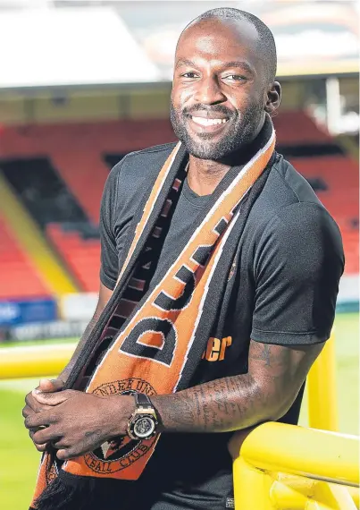  ?? Picture: SNS Group. ?? Patrick N’Koyi in the more relaxed surroundin­gs of Tannadice after signing a one-year deal with the Tangerines.