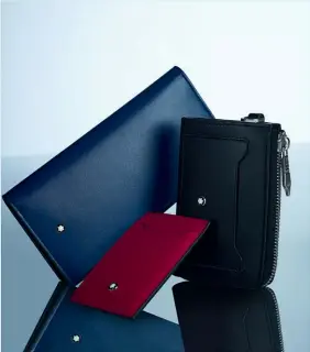  ?? ?? This and facing pages: the new Meisterstü­ck Classic line comprises items such as wallets, a messenger bag, a tote and briefcase, all in the softest of leathers and with the distinctiv­e Montblanc emblem.